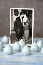 Load image into Gallery viewer, Close-up of a black and white photograph displayed in a Connemara Raindrop porcelain photo holder.