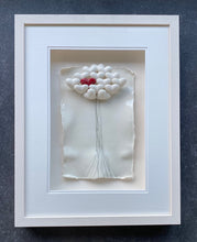 Load image into Gallery viewer, Handmade porcelain wall artwork with white hearts and a red heart centre, inspired by home and love 
