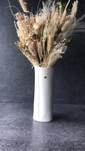 Load image into Gallery viewer, White hand-built porcelain vase with a small gold heart motif, styled with dried flowers against a dark background.
